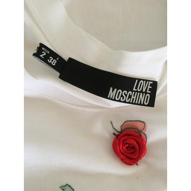 MOSCHINO(モスキーノ)のモスキーノ　ビジュー　カットソー　Tシャツ　リボン レディースのトップス(Tシャツ(半袖/袖なし))の商品写真