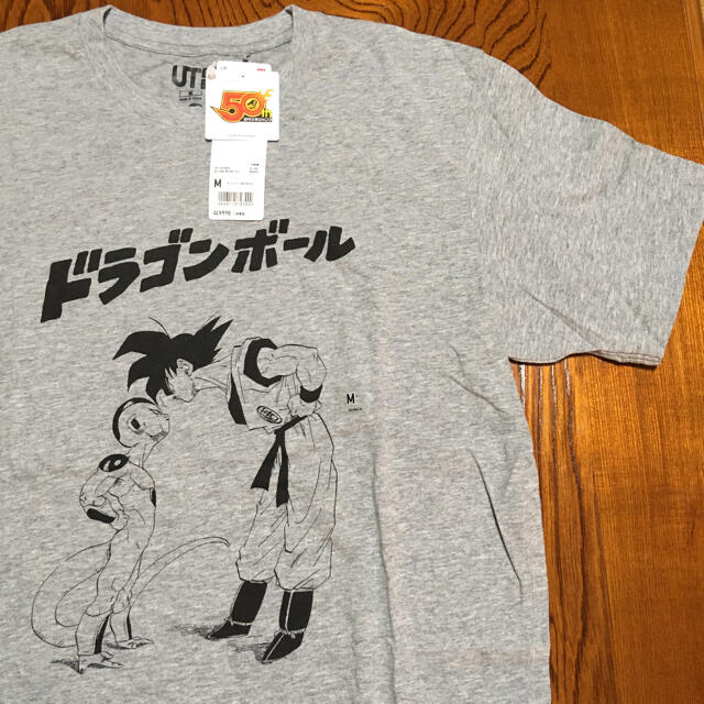 UNIQLO(ユニクロ)の【新品】ドラゴンボール 少年ジャンプ　ユニクロTシャツ　孫悟空×フリーザ　鳥山明 メンズのトップス(Tシャツ/カットソー(半袖/袖なし))の商品写真