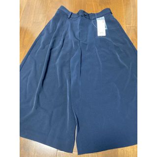 ユニクロ(UNIQLO)のUNIQLO ユニクロ ガウチョパンツ ネイビー 紺 S 新品 未使用(カジュアルパンツ)