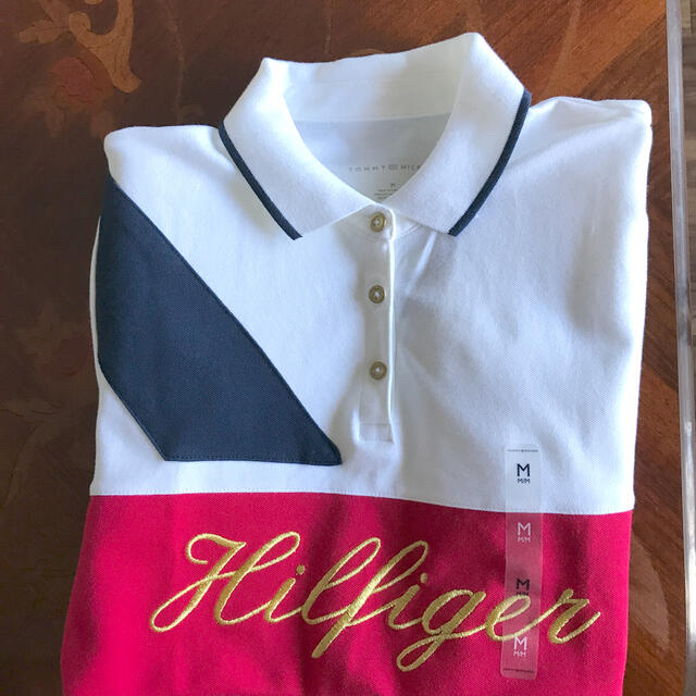TOMMY HILFIGER(トミーヒルフィガー)のトミーハイフィガー ポロシャツ 新品未使用 M お値下げ レディースのトップス(ポロシャツ)の商品写真