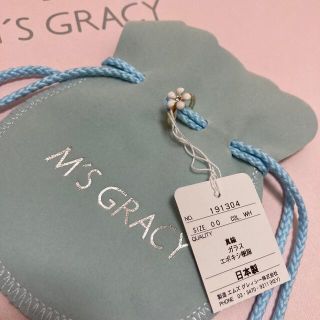 エムズグレイシー(M'S GRACY)の新品　エムズグレイシー　お花のイヤーカフ　白(イヤーカフ)