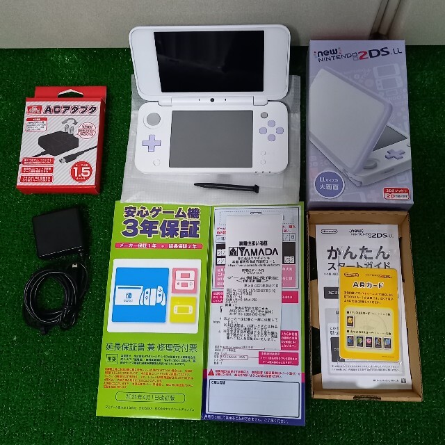 ニンテンドー2DS(ニンテンドー2DS)のNewニンテンドー2DS LL ホワイト×ラベンダー 充電用ACアダプター付き エンタメ/ホビーのゲームソフト/ゲーム機本体(携帯用ゲーム機本体)の商品写真