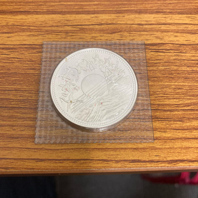 天皇陛下御在位60年記念硬貨 額面10,000円 ・1万円 1枚です。 エンタメ/ホビーの美術品/アンティーク(貨幣)の商品写真