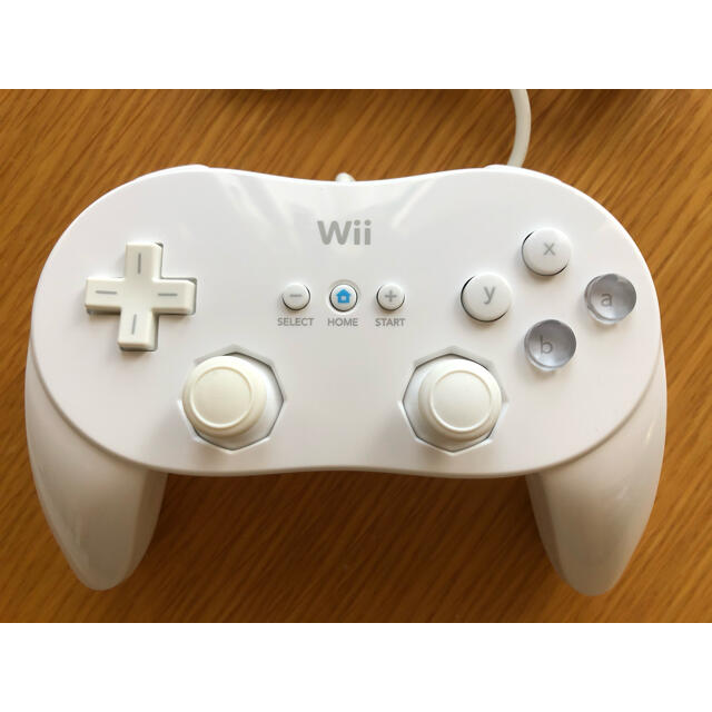 Wii(ウィー)のWii コントローラ white エンタメ/ホビーのゲームソフト/ゲーム機本体(家庭用ゲーム機本体)の商品写真