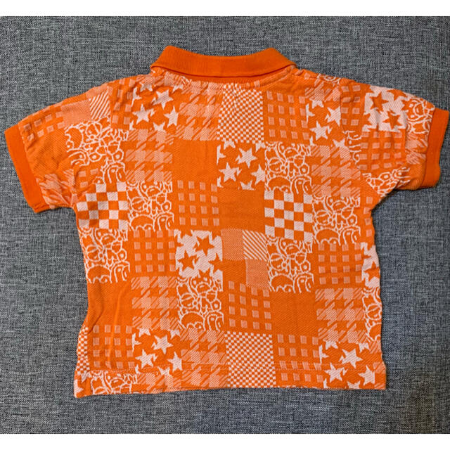A BATHING APE(アベイシングエイプ)のBAPE KIDS オレンジポロシャツ 90 キッズ/ベビー/マタニティのキッズ服男の子用(90cm~)(Tシャツ/カットソー)の商品写真