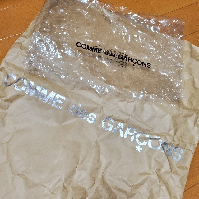 COMME des GARCONS(コムデギャルソン)の新品未使用　コム・デ・ギャルソン　白Tシャツ レディースのトップス(Tシャツ(半袖/袖なし))の商品写真