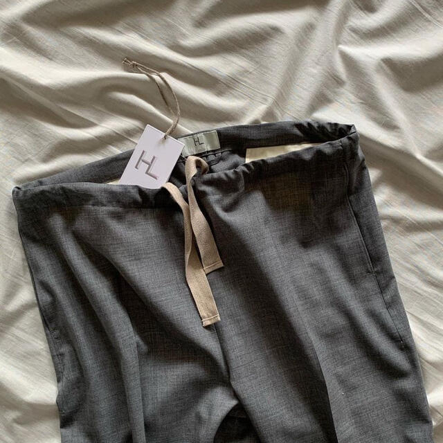 COMOLI(コモリ)のHERILL WOOL TROPICAL EASY PANTS メンズのパンツ(スラックス)の商品写真
