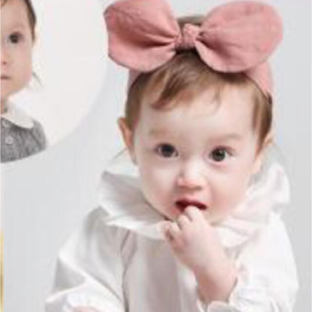 リボンヘアバンド ピンク キッズ/ベビー/マタニティのこども用ファッション小物(その他)の商品写真