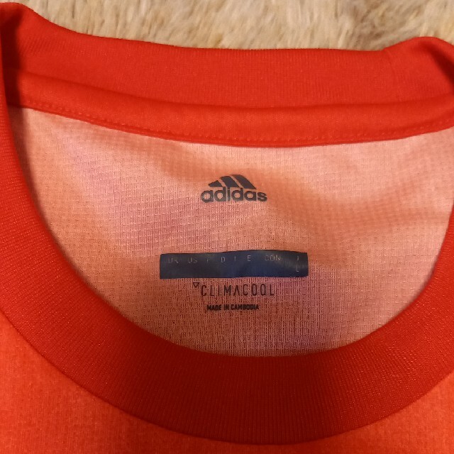 adidas　スポーツ　半袖シャツ　オレンジ　M メンズのトップス(Tシャツ/カットソー(半袖/袖なし))の商品写真