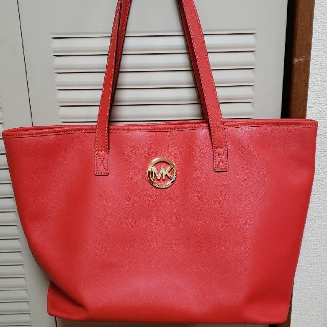 MICHAEL KORS トートバッグ | フリマアプリ ラクマ 正規取扱店販売店 マイケルコース!パンチングレザーバッグ 大容量 美品MICHAELKORS トートバッグ