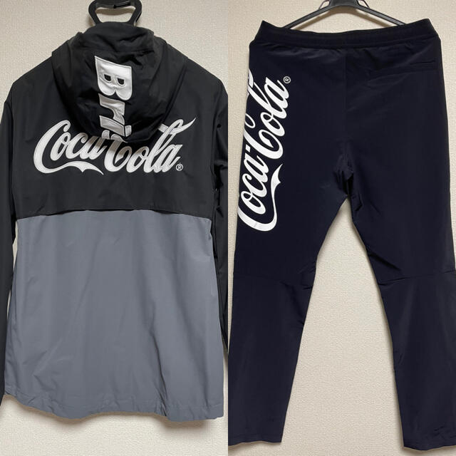 F.C.R.B.(エフシーアールビー)の【美品】F.C.R.B.×Coca-Cola セットアップ 上下Ｍ　黒×グレー メンズのジャケット/アウター(ナイロンジャケット)の商品写真