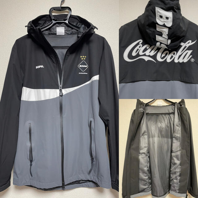 F.C.R.B.(エフシーアールビー)の【美品】F.C.R.B.×Coca-Cola セットアップ 上下Ｍ　黒×グレー メンズのジャケット/アウター(ナイロンジャケット)の商品写真