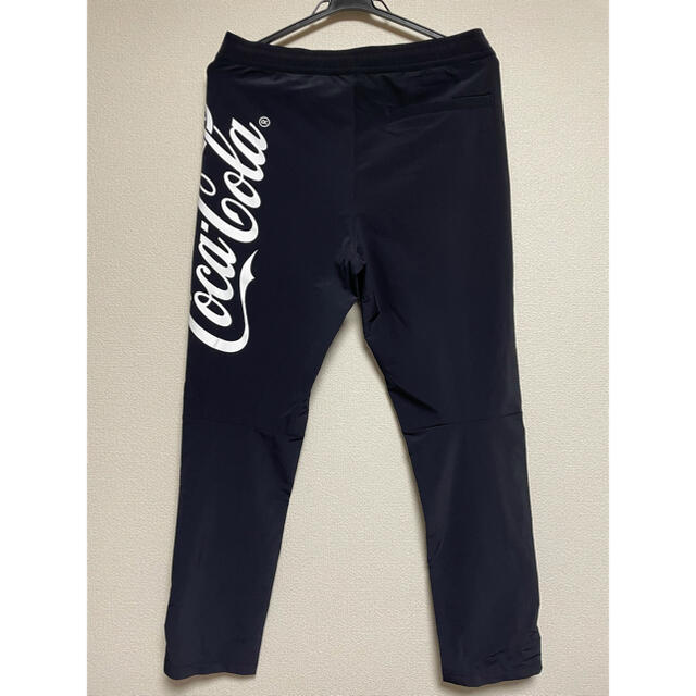 F.C.R.B.(エフシーアールビー)の【美品】F.C.R.B.×Coca-Cola セットアップ 上下Ｍ　黒×グレー メンズのジャケット/アウター(ナイロンジャケット)の商品写真