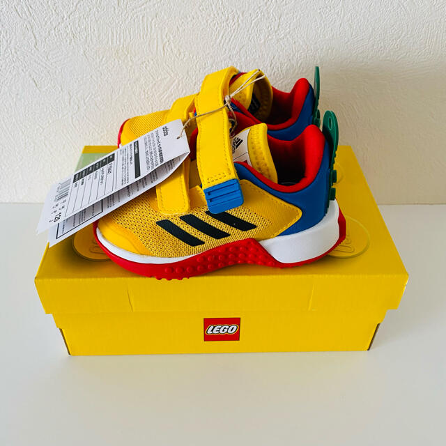 adidas(アディダス)の新品　タグ付き　adidas　LEGO  スニーカー　12cm　黄色 キッズ/ベビー/マタニティのベビー靴/シューズ(~14cm)(スニーカー)の商品写真