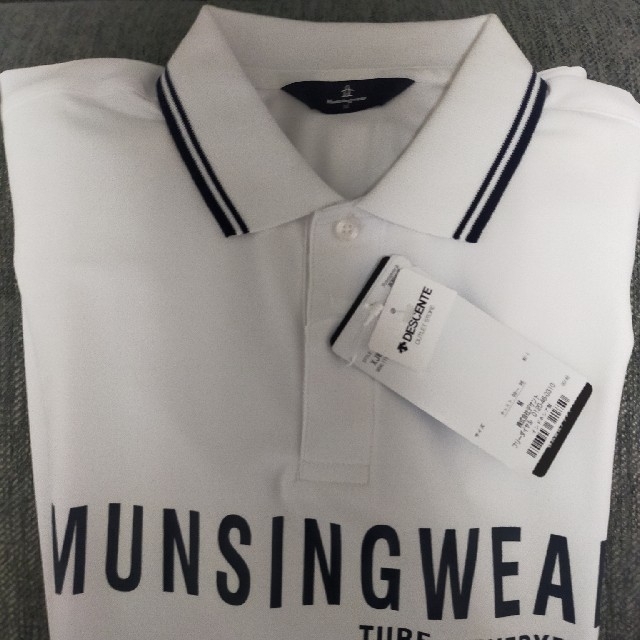 Munsingwear(マンシングウェア)の定価半額以下　かつさん専用　マンシングウェア  ポロシャツ　白 スポーツ/アウトドアのゴルフ(ウエア)の商品写真