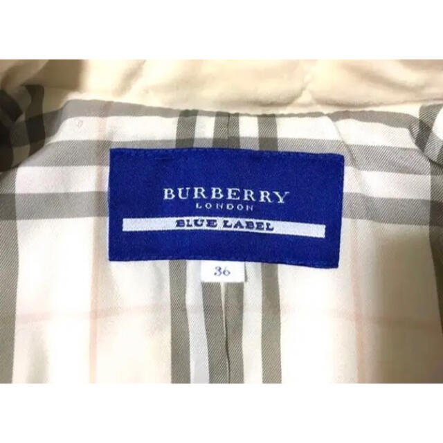 BURBERRY BLUE LABEL(バーバリーブルーレーベル)のバーバリーブルーレーベル　メタルボタンキルティングショートトレンチ　ホワイト レディースのジャケット/アウター(ピーコート)の商品写真