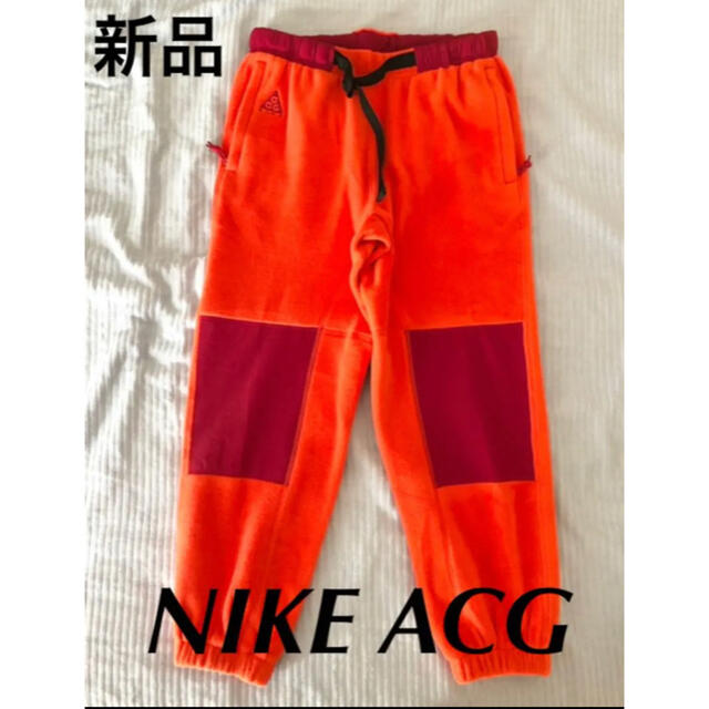 NIKE(ナイキ)の【新品未使用】NIKE ACGフリーストレイルパンツ ハバネロ 赤 メンズのパンツ(その他)の商品写真