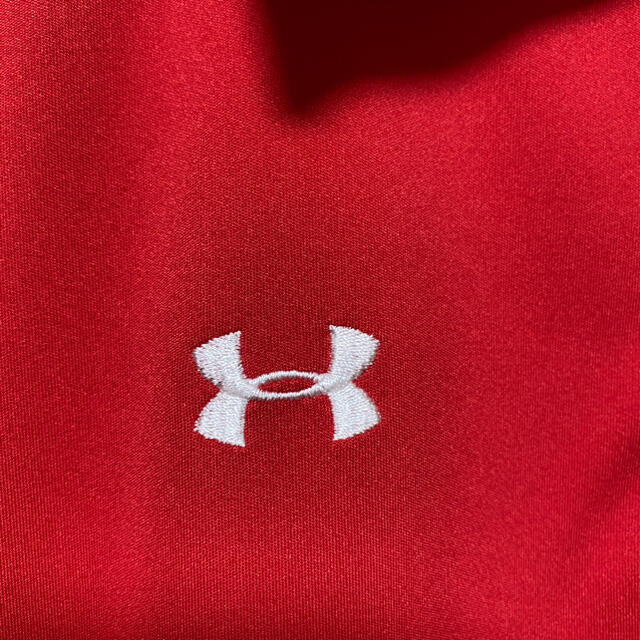 UNDER ARMOUR(アンダーアーマー)のアンダーアーマー　赤　ポロシャツ レディースのトップス(ポロシャツ)の商品写真