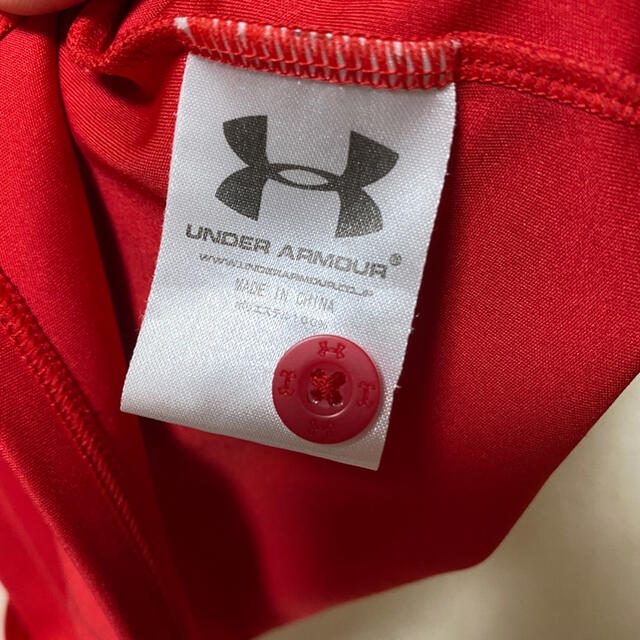 UNDER ARMOUR(アンダーアーマー)のアンダーアーマー　赤　ポロシャツ レディースのトップス(ポロシャツ)の商品写真