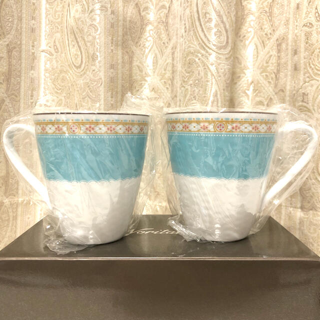 Noritake(ノリタケ)の【新品未開封】Noritake ペアマグカップ　ハミングブルー キッズ/ベビー/マタニティの授乳/お食事用品(マグカップ)の商品写真