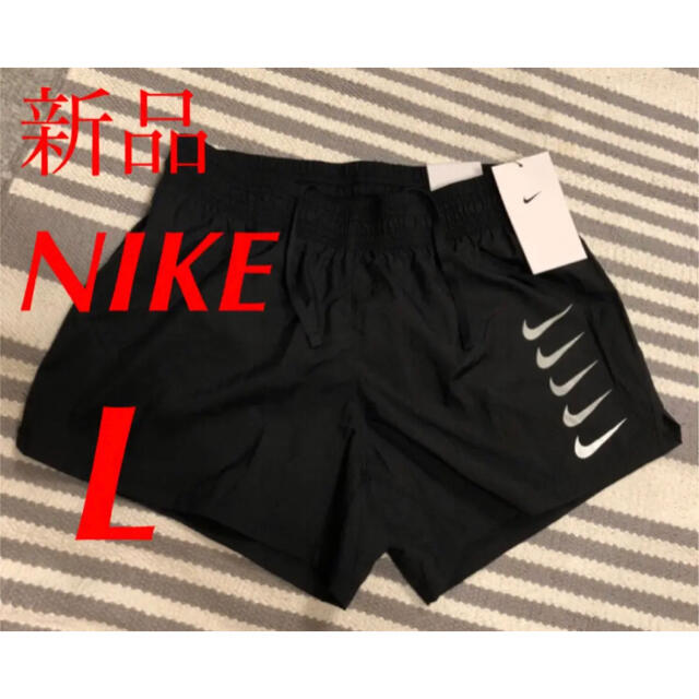 NIKE(ナイキ)の新品 NIKE ナイキ レディース ショートパンツ ラン スウッシュ ランニング レディースのパンツ(ショートパンツ)の商品写真