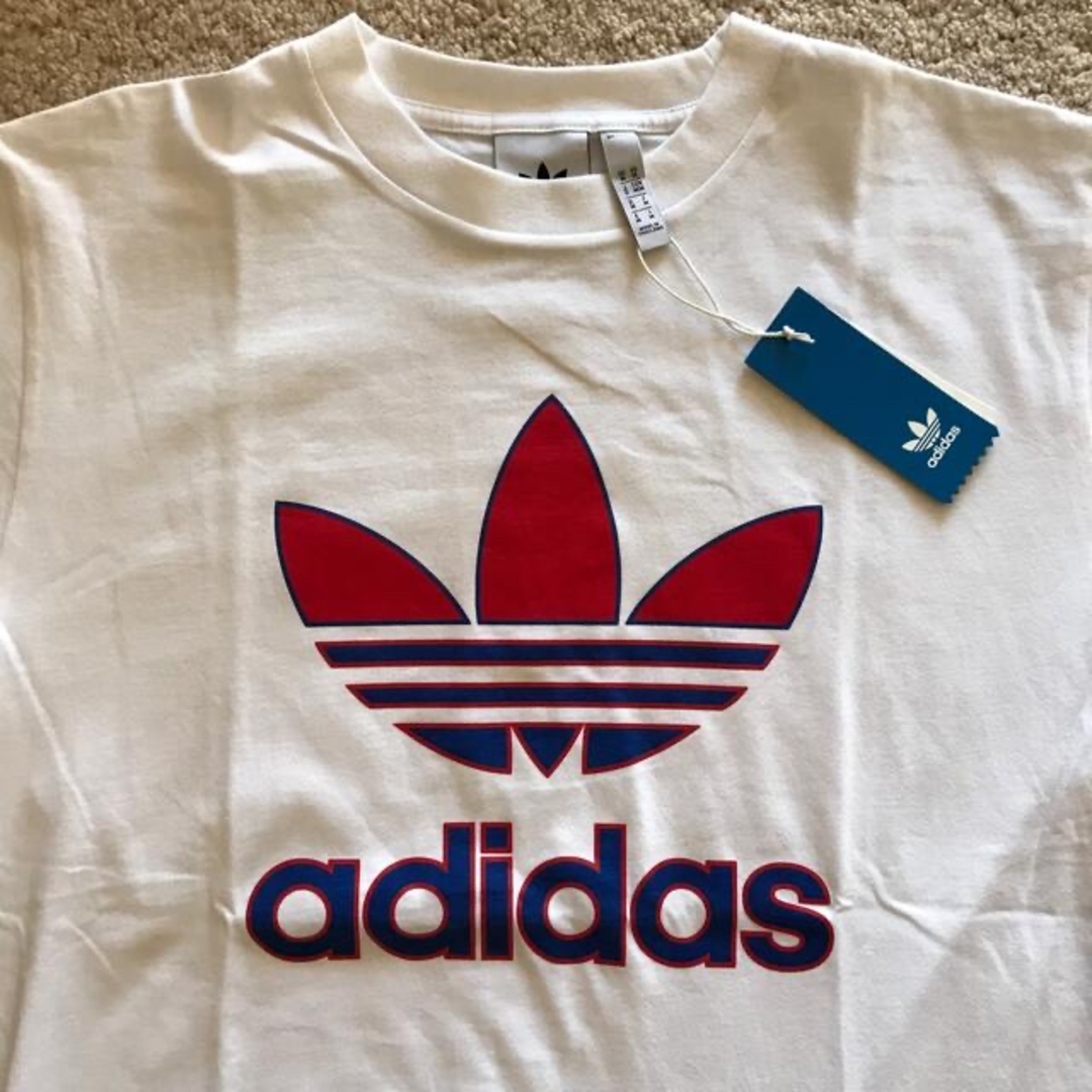 adidas(アディダス)の新品　アディダス　adidas トリコロールカラー　トレフォイルロゴTシャツ メンズのトップス(Tシャツ/カットソー(半袖/袖なし))の商品写真