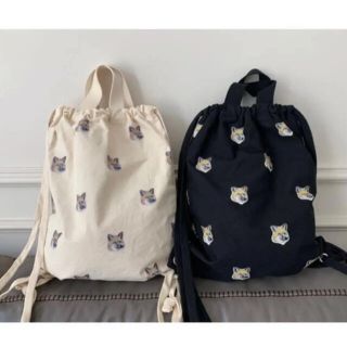 メゾンキツネ(MAISON KITSUNE')のメゾンキツネ　ナップサック　バックパック　リュック(リュック/バックパック)