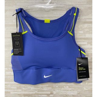 ナイキ(NIKE)の「Lサイズ」NIKE ナイキ スウッシュ　ポケット　スポーツブラ　紫(トレーニング用品)