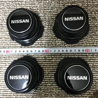 ニッサン(日産)の日産純正　スチールホイール用センターキャップ　4個セット(車外アクセサリ)