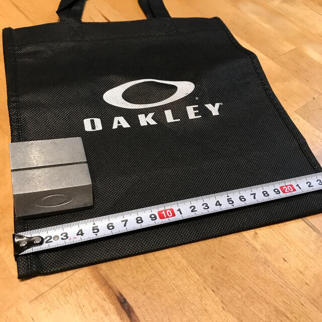 Oakley(オークリー)のgaiao様専用⭐︎オークリー ペーパースタンド&ショップ袋　プラスおまけ付き。 メンズのファッション小物(その他)の商品写真