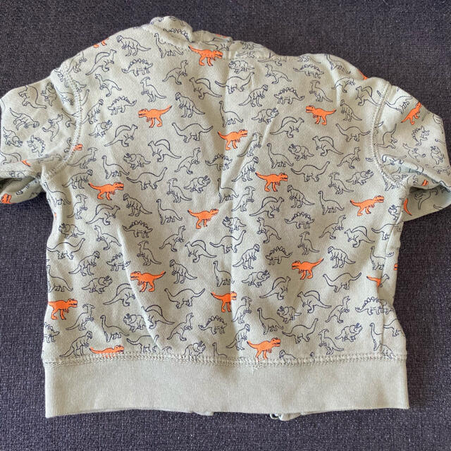 babyGAP(ベビーギャップ)の恐竜柄ジップアップパーカー キッズ/ベビー/マタニティのベビー服(~85cm)(トレーナー)の商品写真