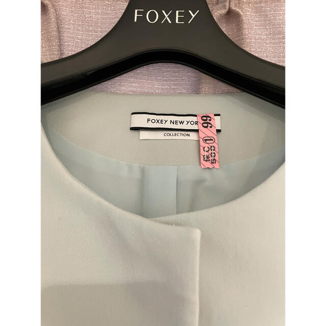 FOXEY(フォクシー)のfoxy New York フォクシー　ニューヨーク　フリル　ノーカラーコート レディースのジャケット/アウター(ロングコート)の商品写真