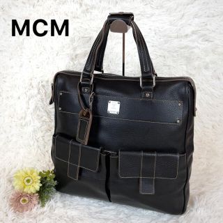 エムシーエム(MCM)の【美品】MCM ビジネスバッグ トラベル シボ 革 ヌバック チャーム ブラック(トートバッグ)