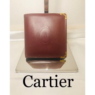 カルティエ(Cartier)のカルティエ　二つ折り財布　金具　革　マストライン　ボルドー　ロゴ　型押し(財布)