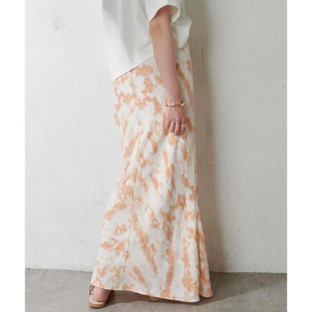Discoat(ディスコート)のDiscoat♥︎新品未使用オレンジ柄スカートLサイズ レディースのスカート(ロングスカート)の商品写真