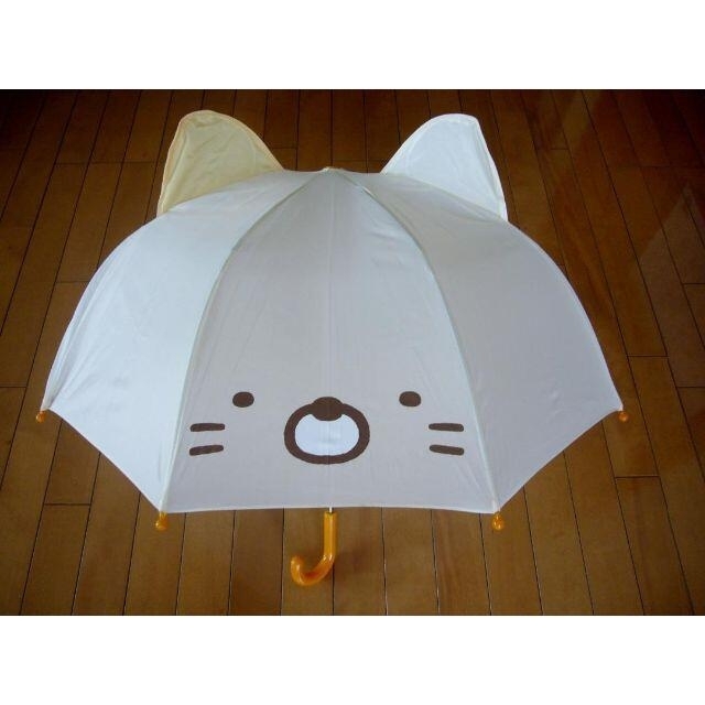 値下げ中●子供用耳つき傘・すみっコぐらし 　ねこ・雨の日が楽しそう・新品・ キッズ/ベビー/マタニティのこども用ファッション小物(傘)の商品写真