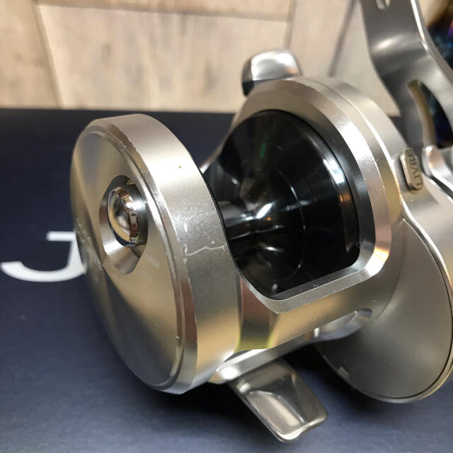 SHIMANO(シマノ)のオシアジガー   1501HG リブレTB-1 チタンノブ　ラインストッパー付き スポーツ/アウトドアのフィッシング(リール)の商品写真