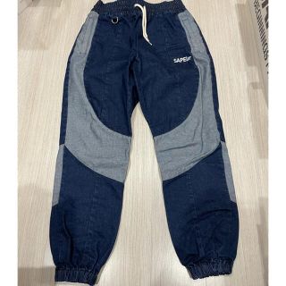 ナイキ(NIKE)のsapeur DENIM トラックパンツ Ｌ(デニム/ジーンズ)