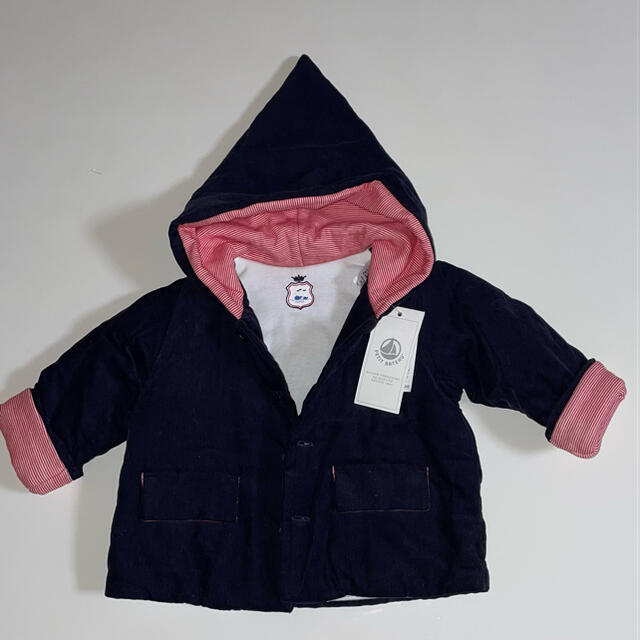 PETIT BATEAU(プチバトー)の新品　タグ付き　プチバトー  とんがり帽子　中綿入りアウター キッズ/ベビー/マタニティのベビー服(~85cm)(ジャケット/コート)の商品写真