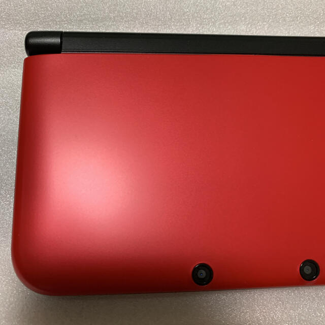 ニンテンドー3DS(ニンテンドー3DS)の任天堂　3DSLL本体　レッドブラック エンタメ/ホビーのゲームソフト/ゲーム機本体(携帯用ゲーム機本体)の商品写真