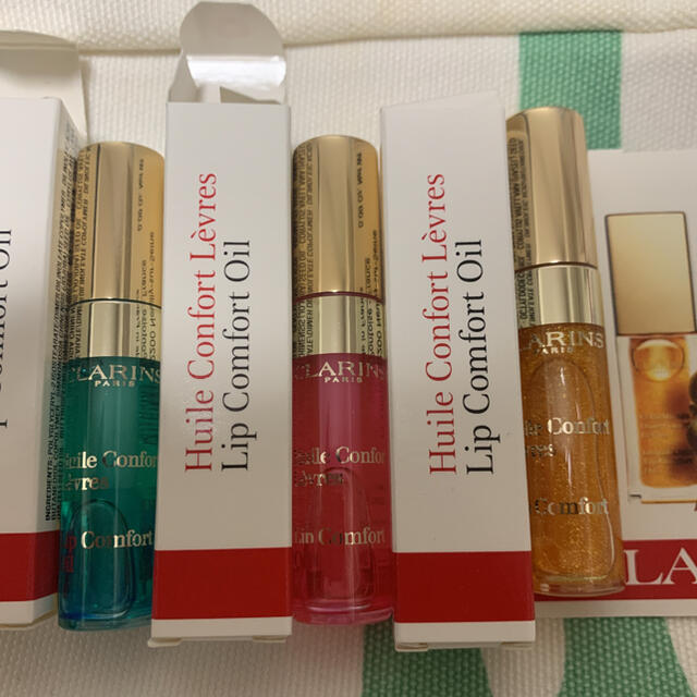 CLARINS(クラランス)のクラランスコンフォートリップオイル　ミニ3点セット コスメ/美容のベースメイク/化粧品(リップグロス)の商品写真