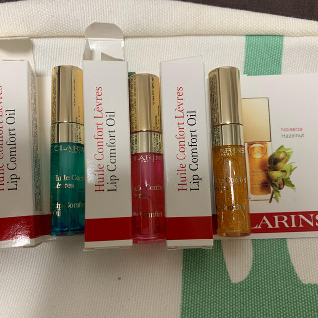 CLARINS(クラランス)のクラランスコンフォートリップオイル　ミニ3点セット コスメ/美容のベースメイク/化粧品(リップグロス)の商品写真