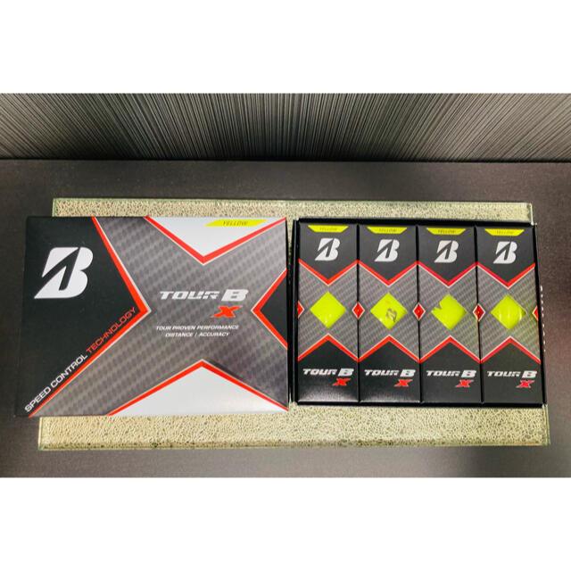 BRIDGESTONE(ブリヂストン)の新品）ブリヂストン　ゴルフボール　TOUR B X  イエロー　1ダース　12球 スポーツ/アウトドアのゴルフ(その他)の商品写真