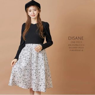 トッコ(tocco)のＶネックリブカットソー×ラインフラワープリントドッキングワンピース【disane(ひざ丈ワンピース)