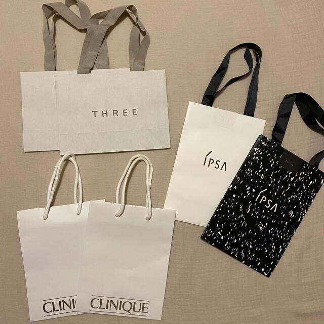 THREE(スリー)のTHREE.IPSA.CLINIQUE紙袋セット レディースのバッグ(ショップ袋)の商品写真