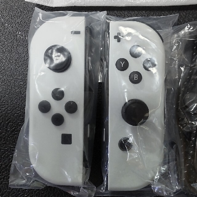 まった Nintendo Switch - ジョイコン白 ストラップ グリップ