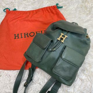 HIROFU ミニリュック 巾着 Hロゴ ゴールド金具 グリーン シボ革(リュック/バックパック)