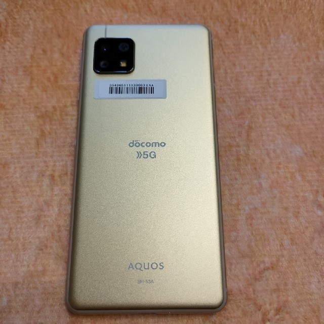 AQUOS(アクオス)の【中古】AQUOS sense5G イエローゴールド スマホ/家電/カメラのスマートフォン/携帯電話(スマートフォン本体)の商品写真