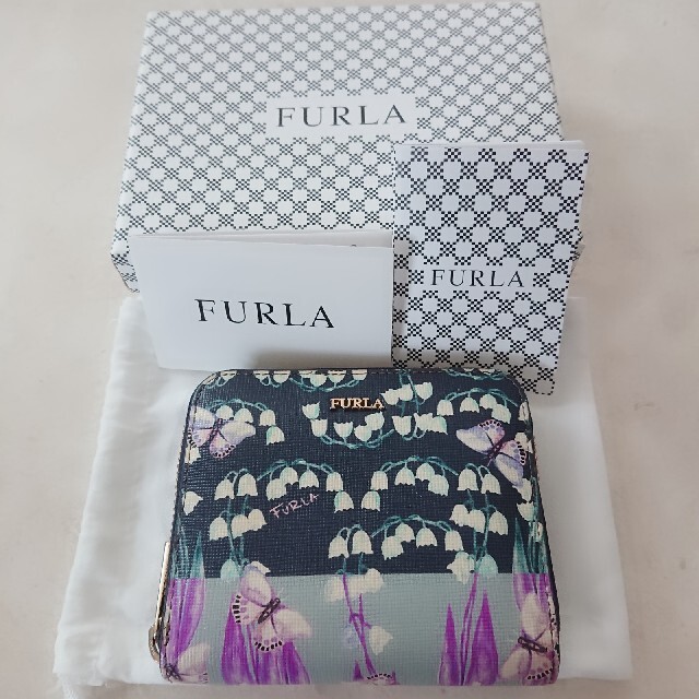 Furla(フルラ)の【使用感あり】FURLA 折財布 すずらん柄 幸せの訪れ レディースのファッション小物(財布)の商品写真