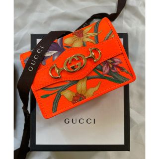 グッチ(Gucci)の【新品未使用】GUCCI グッチ　2つ折り財布　フローラ　オレンジ　ネオン 花柄(財布)